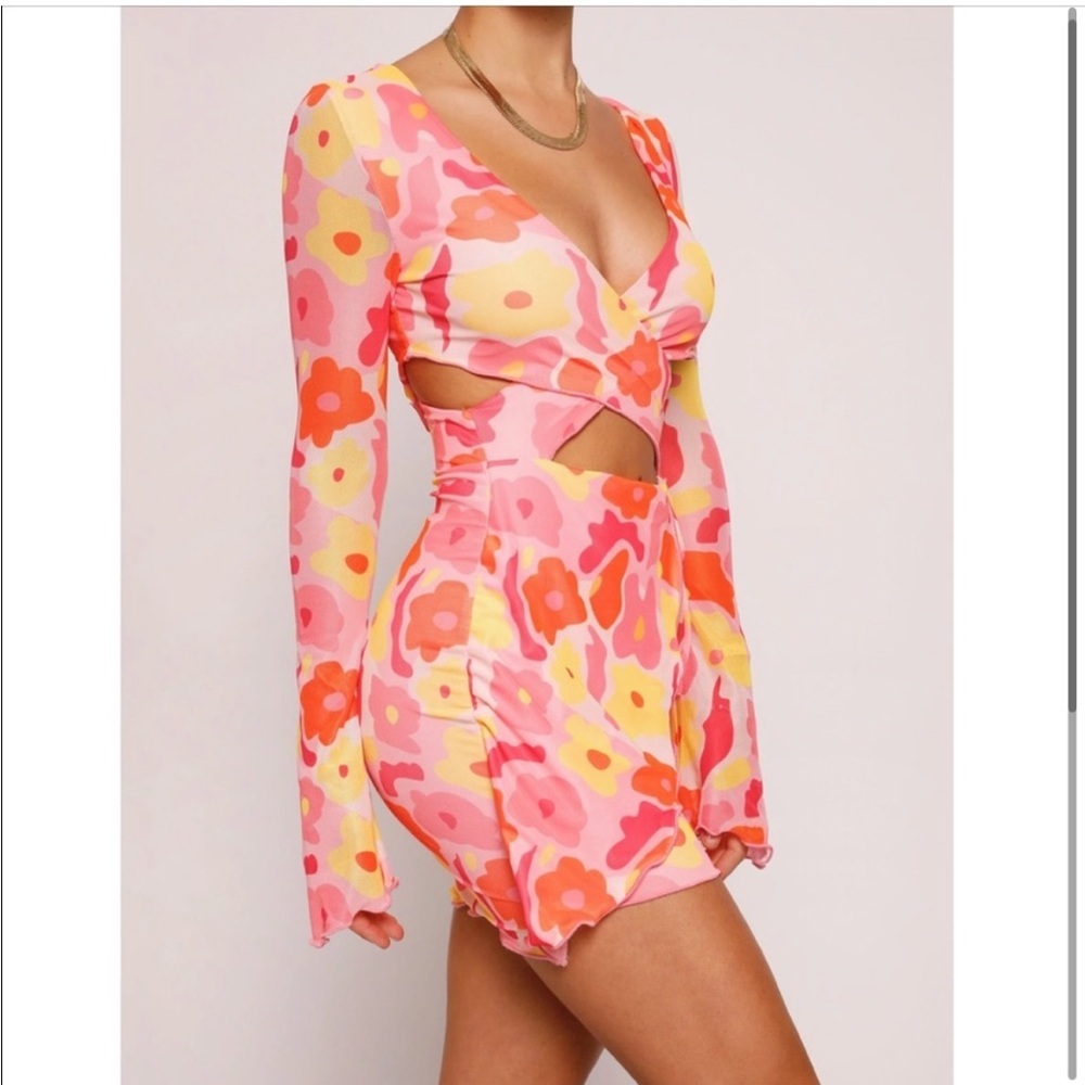 Tiger mist floral patterned window cutout long sleeve mini dress. Size S